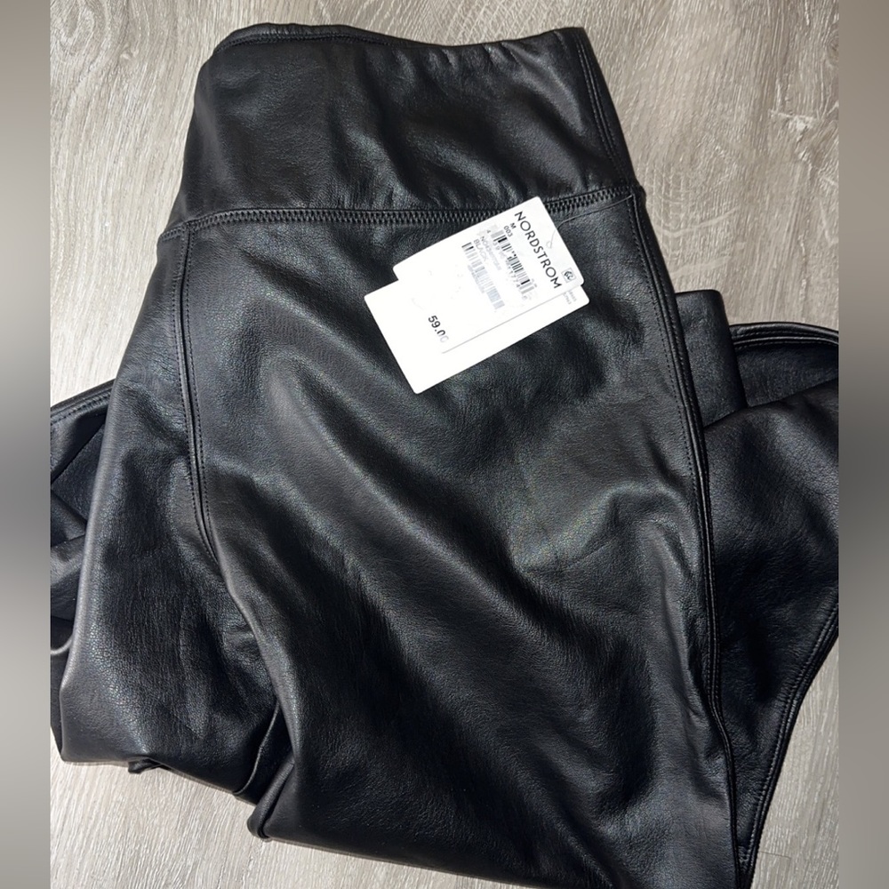 Black leather like leggings.